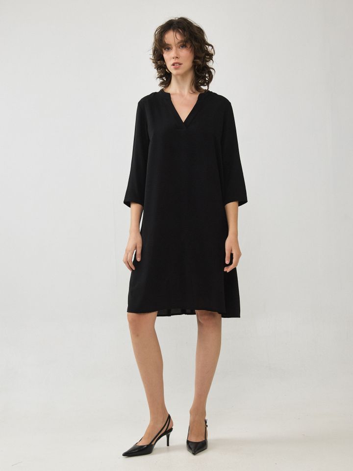 שמלה וי וולנים