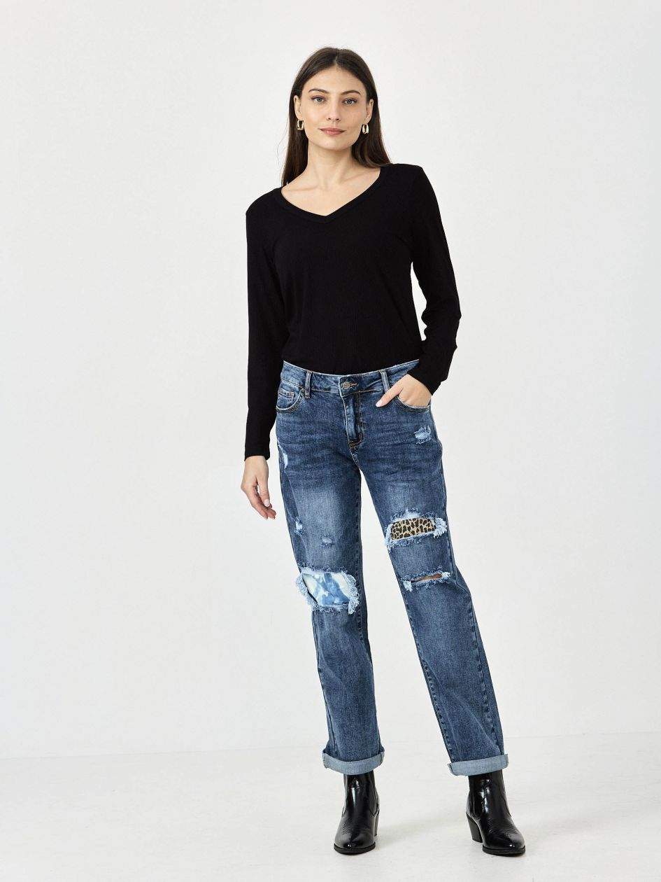 מכנסי ג’ינס קרעים מנומר