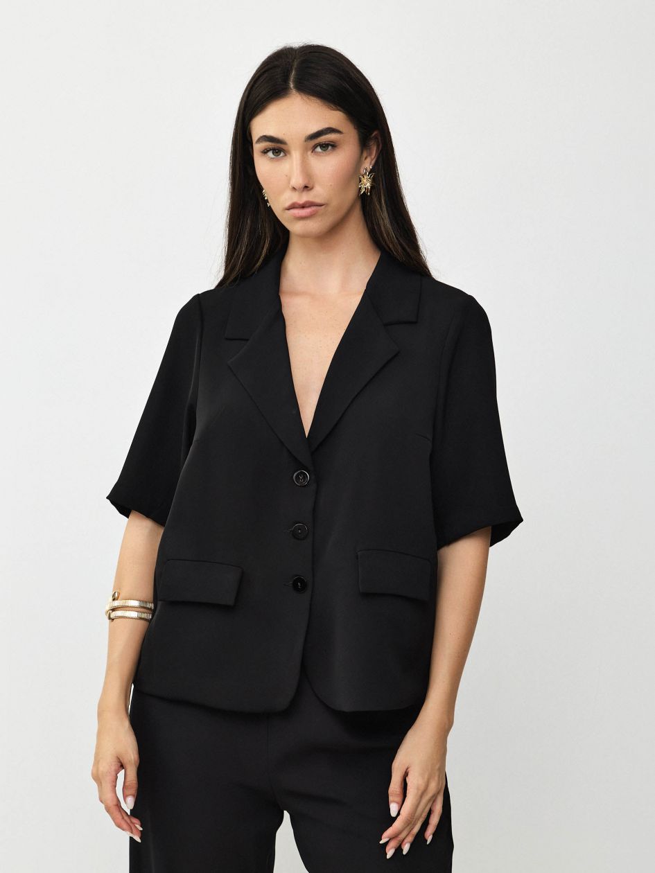 ג`קט כיסים קלאפות