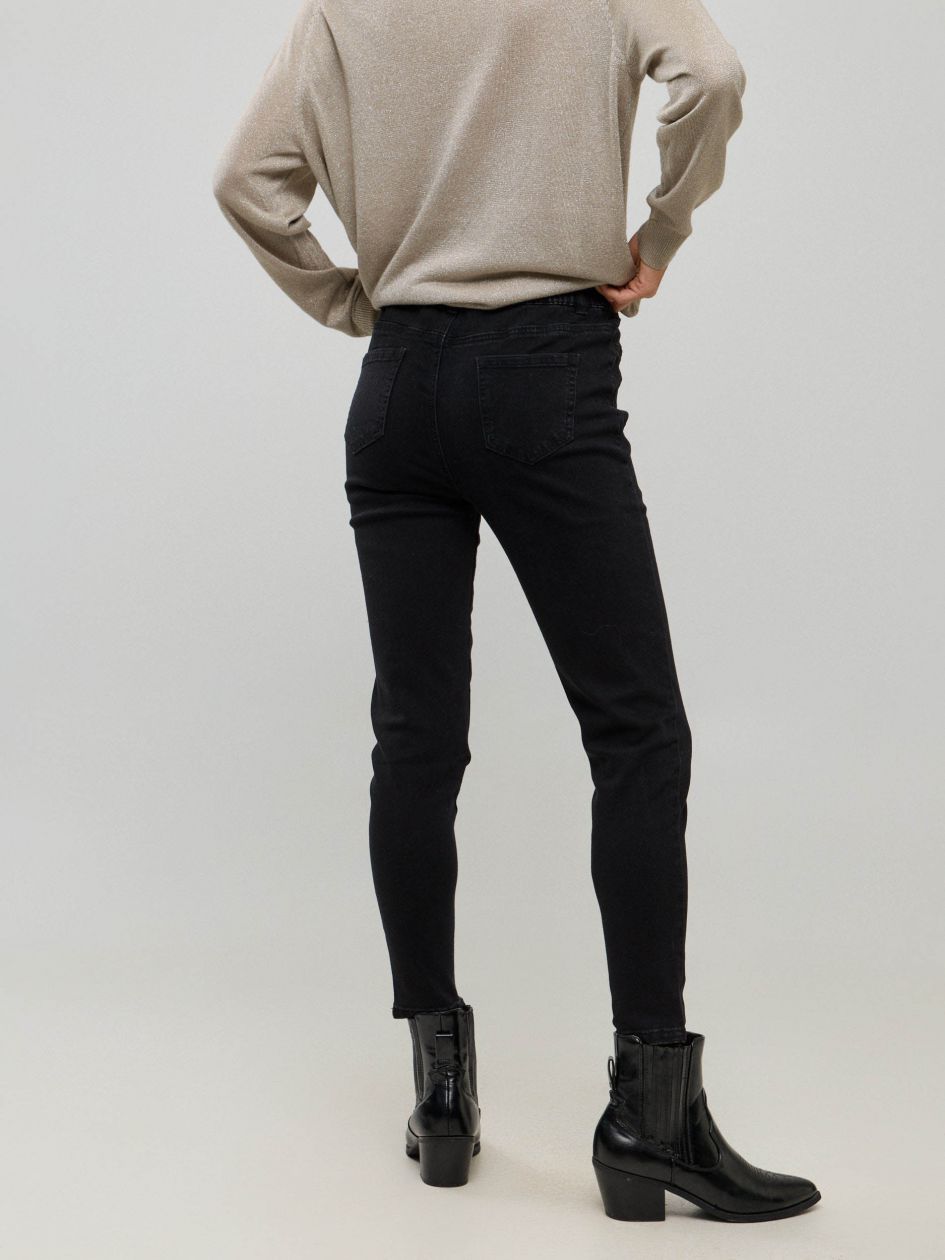 טייטס ג`ינס