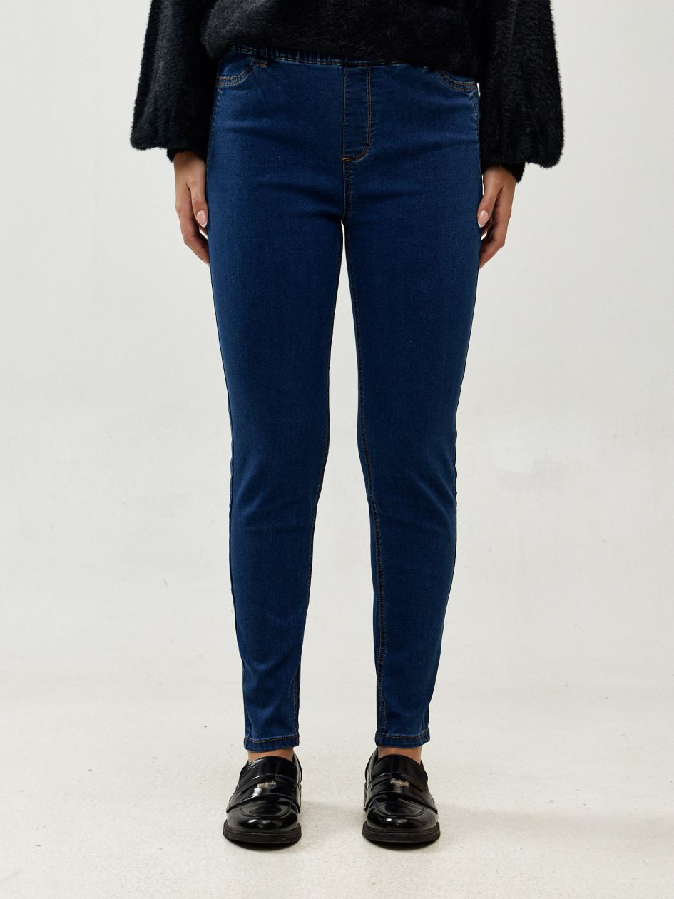 טייטס ג`ינס