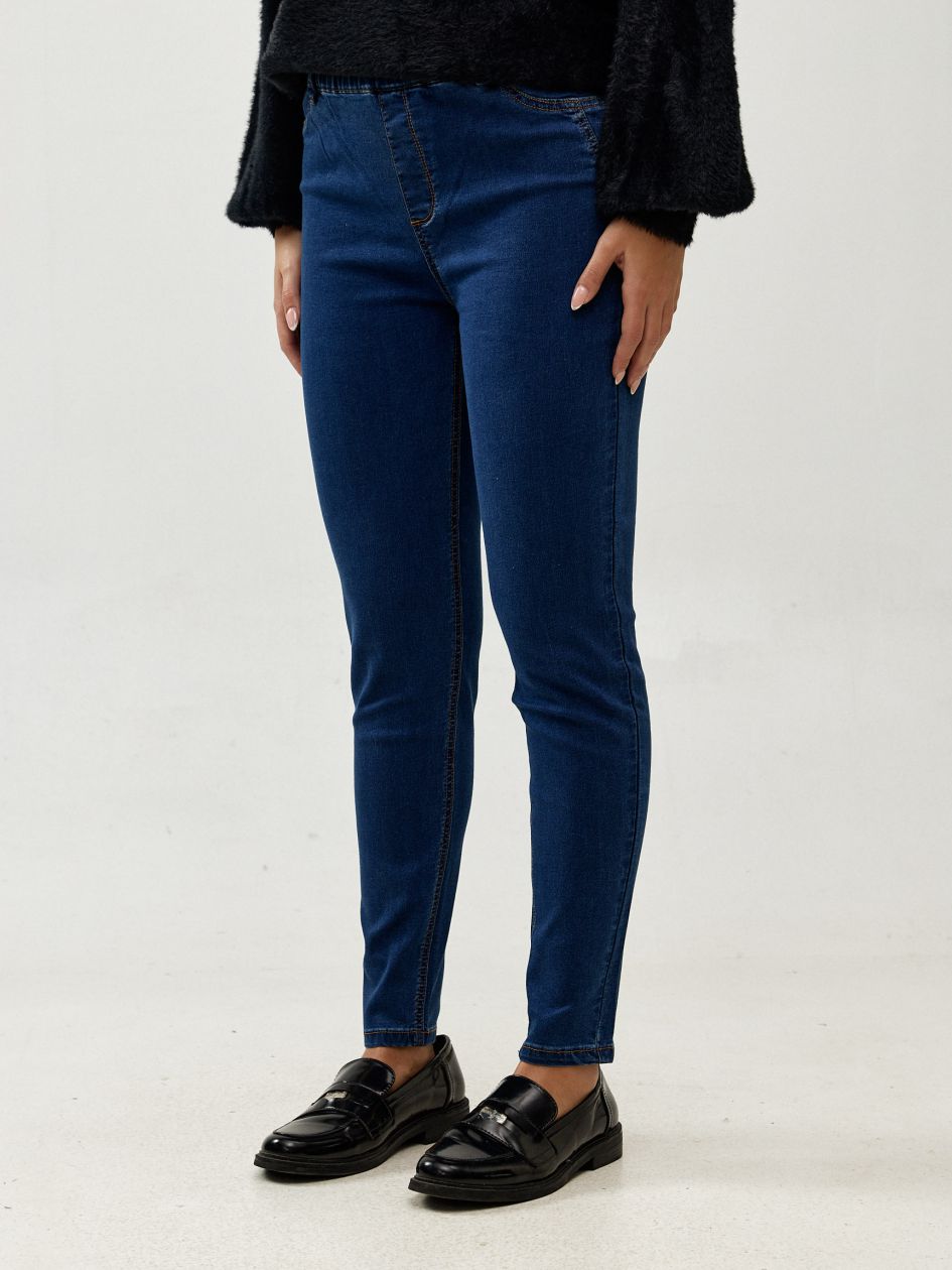 טייטס ג`ינס