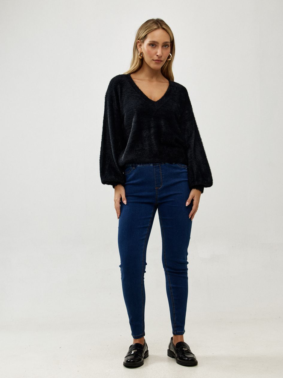 טייטס ג`ינס