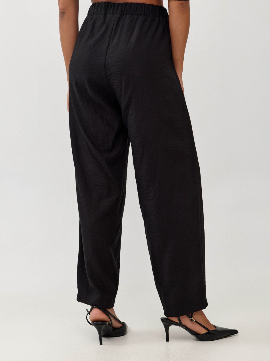 מכנסיים אריג קשירה