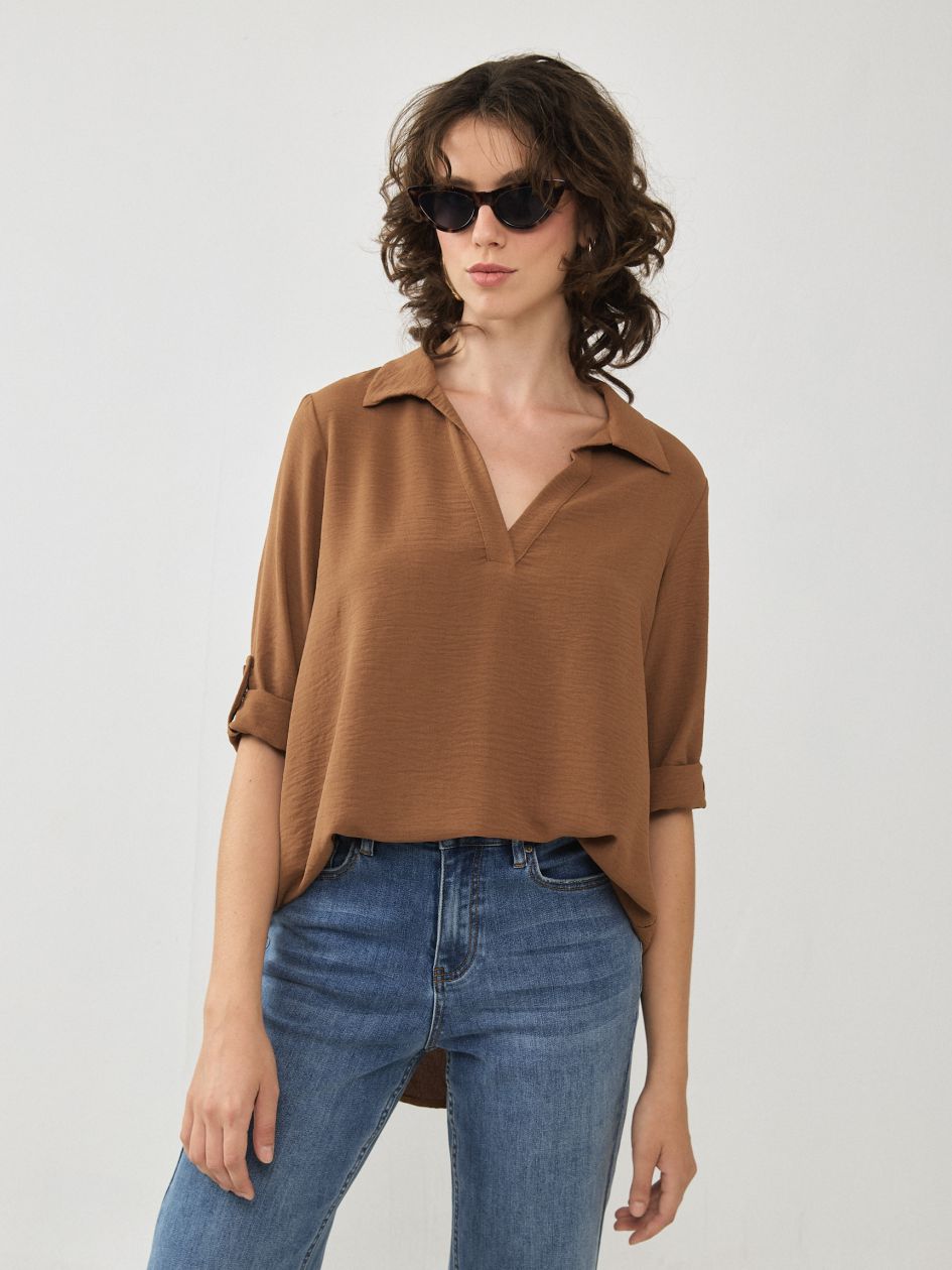 חולצה שרוול קלאפות