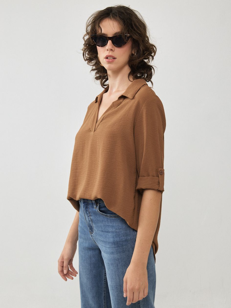 חולצה שרוול קלאפות