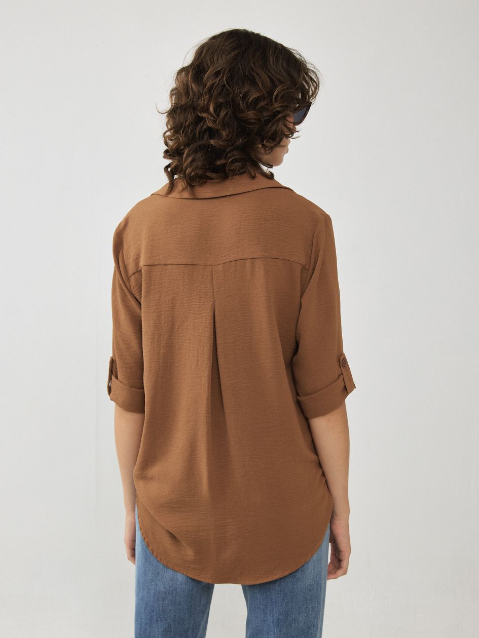 חולצה שרוול קלאפות